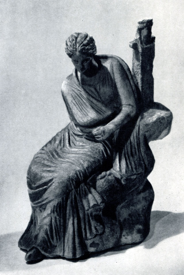 Женщина, сидящая возле гермы Диониса